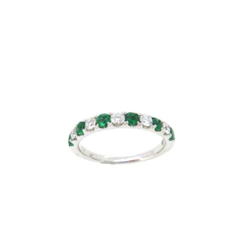 18ct white gold Emerald and Diamond half eternity ring.